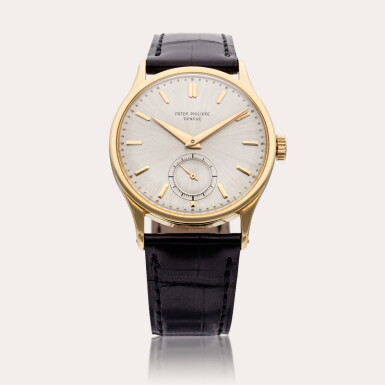 View full screen - View 1 of Lot 673. Reference 570 | A yellow gold wristwatch, Made in 1951.