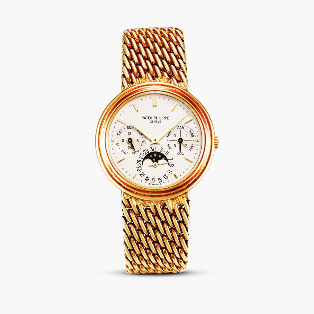 View full screen - View 1 of Lot 2266. Reference 3945 | A yellow gold perpetual calendar bracelet watch with moon phases, 24 hour and leap year indication, Circa 1990.