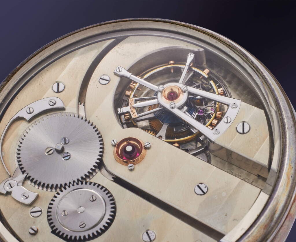 View full screen - View 1 of Lot 38. A very fine keyless one-minute tourbillon watch in silver open-faced exhibition case, Circa 1930.