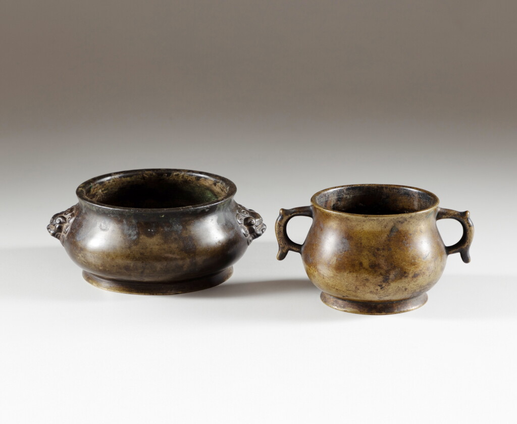 View full screen - View 1 of Lot 77. Two bronze incense burners, Ming and Qing dynasty | 明及清 銅雙耳三足爐一組兩件.