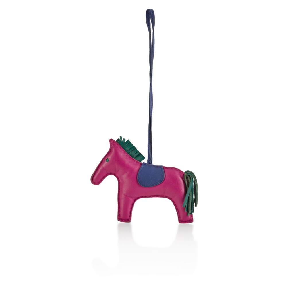 View full screen - View 1 of Lot 208. HERMÈS | ROSE POURPRE/MALACHITE/BLEU ELECTRIQUE HORSE RODEO BAG CHARM, 2018.
