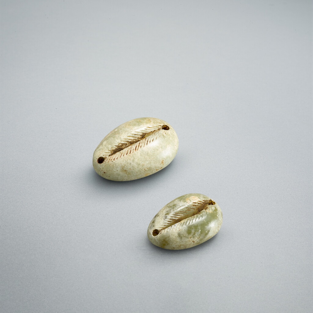 View full screen - View 1 of Lot 761. Two jade 'shell' beads, Western Han dynasty | 西漢 玉貝一對.