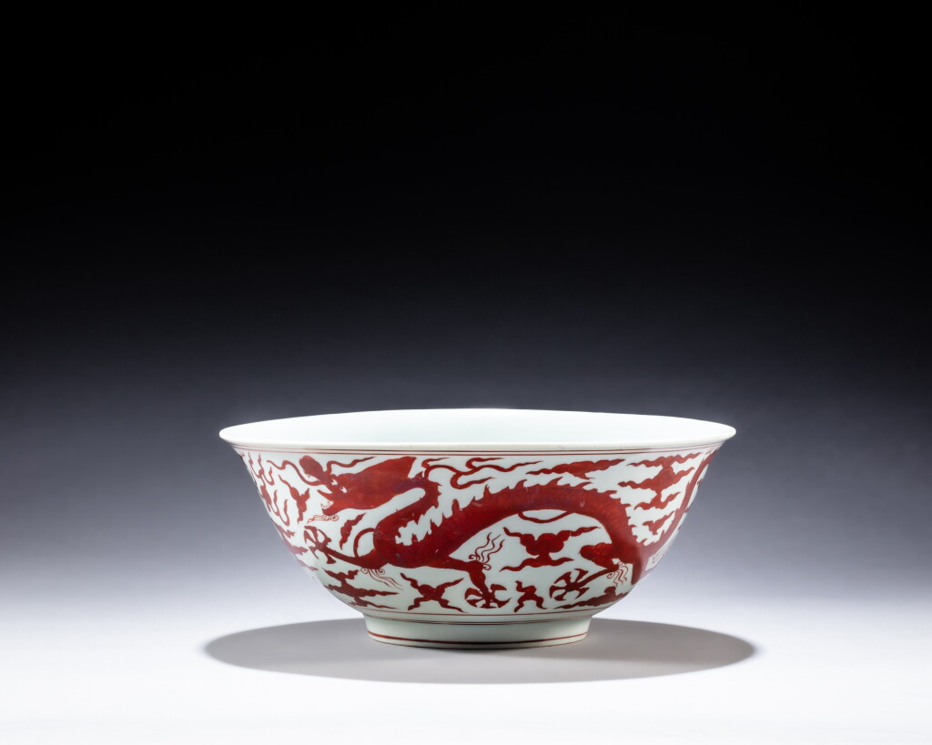 View full screen - View 1 of Lot 126. A rare large iron-red 'dragon' bowl, Mark and period of Jiajing | 明嘉靖 礬紅彩雙龍戲珠紋大盌 《大明嘉靖年製》款.