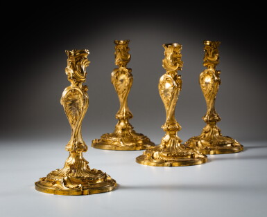 View full screen - View 1 of Lot 38. Two pairs of gilt-bronze candlesticks, in the manner of Jules-Aurèle Meissonnier (1675-1750), Louis XV, circa 1730 | Suite de deux paires en bronze ciselé et doré d'époque Louis XV, dans le style de Jules-Aurèle Meissonnier (1675-1750), circa 1730.