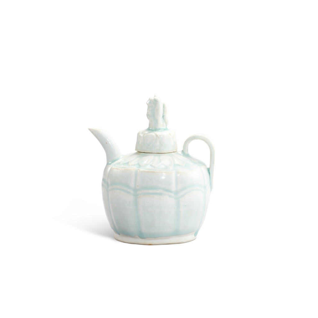 View full screen - View 1 of Lot 3462. A qingbai 'lotus' ewer and cover, Southern Song dynasty | 南宋 青白蓮紋執壺連瑞獸鈕蓋.