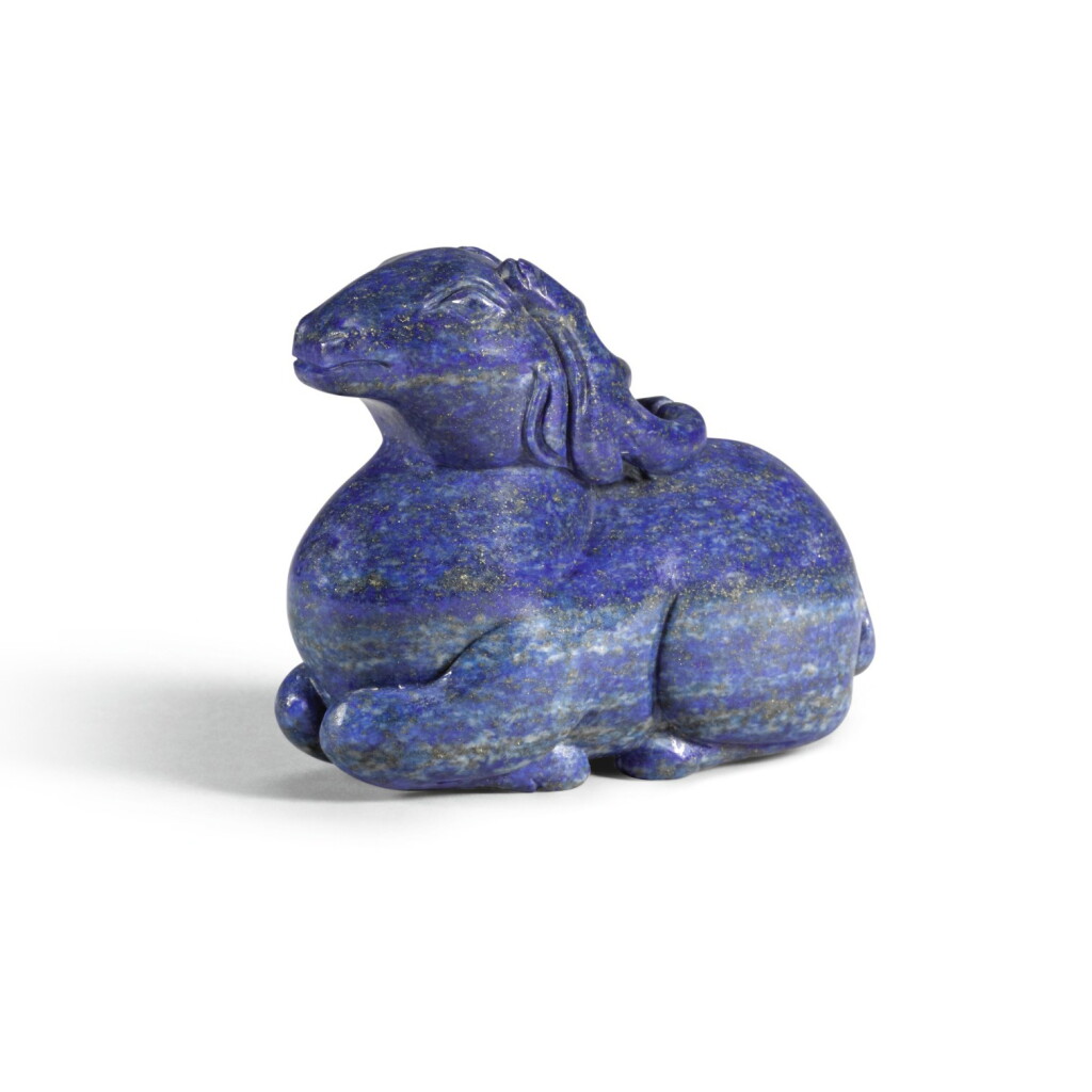 View full screen - View 1 of Lot 285. A SMALL LAPIS LAZULI FIGURE OF A DEER, QING DYNASTY, 18TH/19TH CENTURY | 清十八/十九世紀 青金石臥鹿.