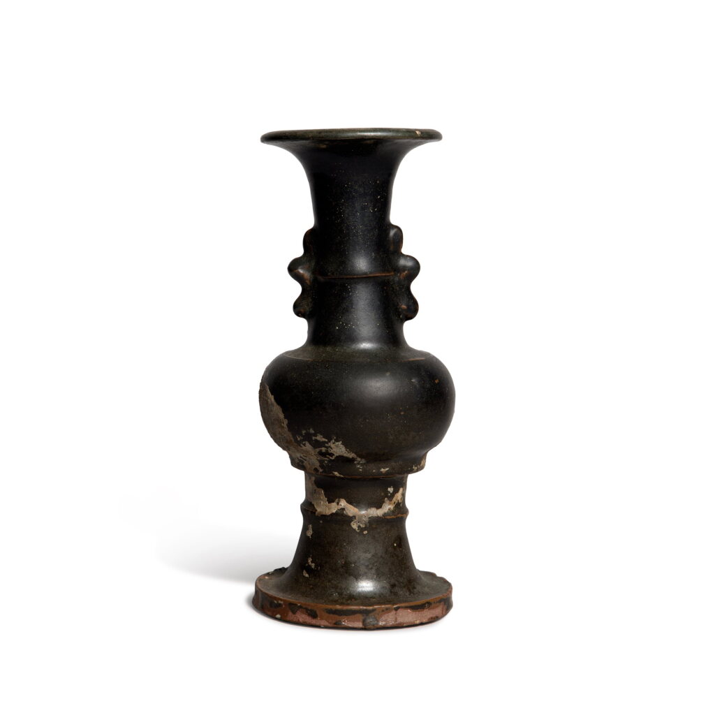 View full screen - View 1 of Lot 691. A brown-glazed gu-form handled vase, Yuan dynasty | 元 褐釉雙耳觚.