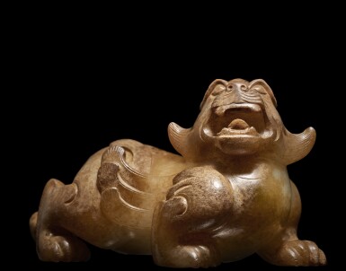 View full screen - View 1 of Lot 923. An exceptionally rare and superb white and russet jade mythical beast, Han dynasty | 漢 玉神獸.