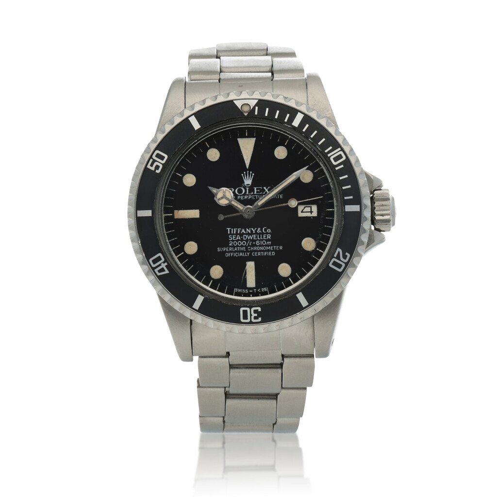 View full screen - View 1 of Lot 9. Retailed by Tiffany & Co.: 'Great White' Sea-Dweller, Ref. 1665, Stainless steel wristwatch with date, helium escape valve and bracelet Circa 1978 | 勞力士 | 零售商為蒂芙尼:1665型號「'Great White' Sea-Dweller」精鋼鍊帶腕錶備日期顯示及排氦閥,約1978年製.
