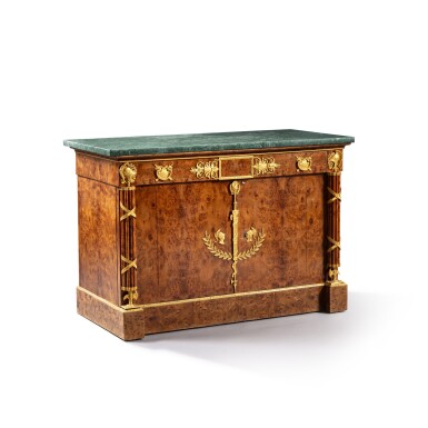 View full screen - View 1 of Lot 197. An Empire gilt-bronze mounted burr commode à vantaux, circa 1810, attributed to Charles-Joseph Lemarchand | Commode à vantaux en placage de loupe et bronze doré, première moitié du XIXe siècle, attribuée à Charles-Joseph Lemarchand.