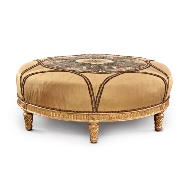 View full screen - View 1 of Lot 214. A Louis XVI Style Giltwood Circular Ottoman with a Silk and Embroidery Covering.