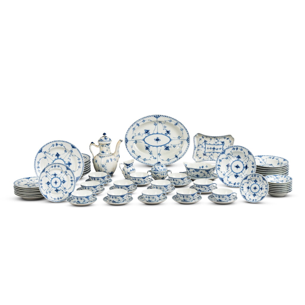 View full screen - View 1 of Lot 755. A Royal Copenhagen Porcelain Blue Fluted 'Half-Lace' Dinner and Coffee Service for Eight, Mid-20th Century.
