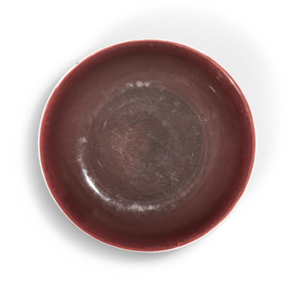 View full screen - View 1 of Lot 912. A copper-red-glazed dish, Seal mark and period of Jiaqing | 清嘉慶 紅釉盤 《大清嘉慶年製》款.