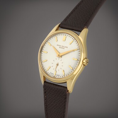 View full screen - View 1 of Lot 5. Calatrava, 'Double Swiss' Reference 2526 | A yellow gold wristwatch with a first series enamel dial | Circa 1954.