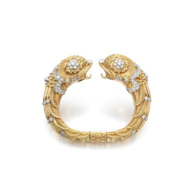 View full screen - View 1 of Lot 552. Gold and diamond bangle, circa 1950.