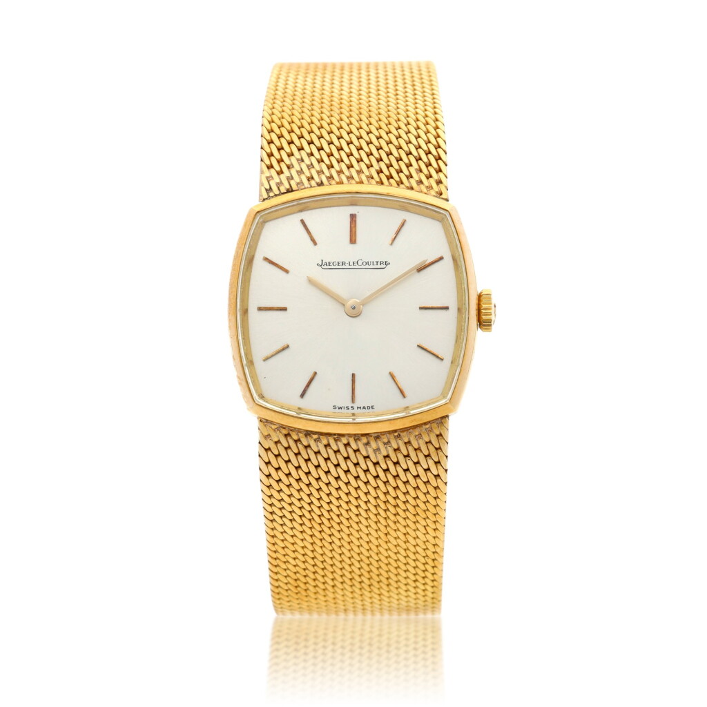 View full screen - View 1 of Lot 21. A yellow gold cushion shaped bracelet watch, Circa 1980.