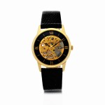 UNIVERSAL GENÈVE | THE INTERNATIONAL MUSEUM OF HOROLOGY SKELETON WATCH A YELLOW GOLD SEMI-SKELETONIZED WRISTWATCH, CIRCA 1986