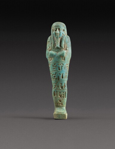 View full screen - View 1 of Lot 151. An Egyptian Turquoise Faience Ushabti, 30th dynasty, 380-342 B.C..