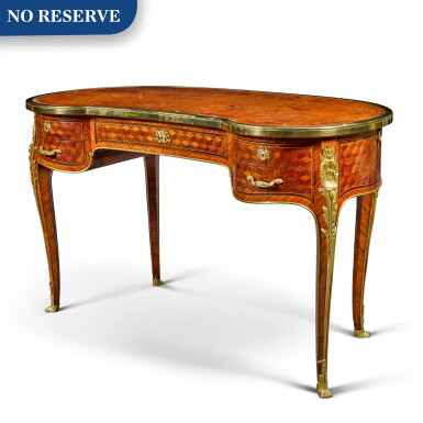 View full screen - View 1 of Lot 84. A French gilt-bronze mounted kingwood parquetry bureau rognon, circa 1920.