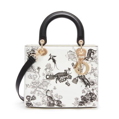 View full screen - View 1 of Lot 8569. White and Black Motif Patent Toile de Jouy Medium Lady Dior Bag in Patent Leather with Brass Hardware, 2016.