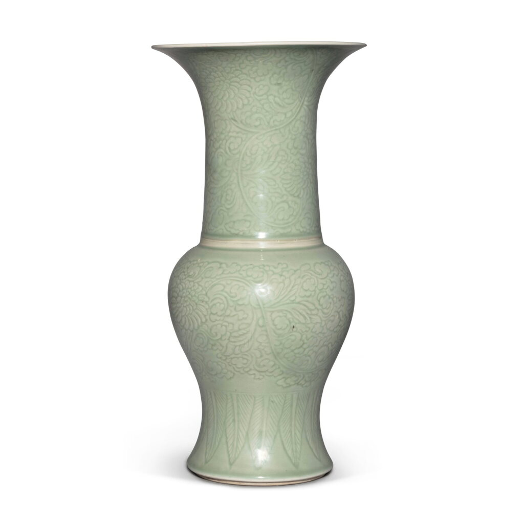 View full screen - View 1 of Lot 410. A celadon-glazed 'peony scroll' yenyen vase, Qing dynasty, Kangxi period | 清康熙 青釉刻牡丹紋鳳尾尊.