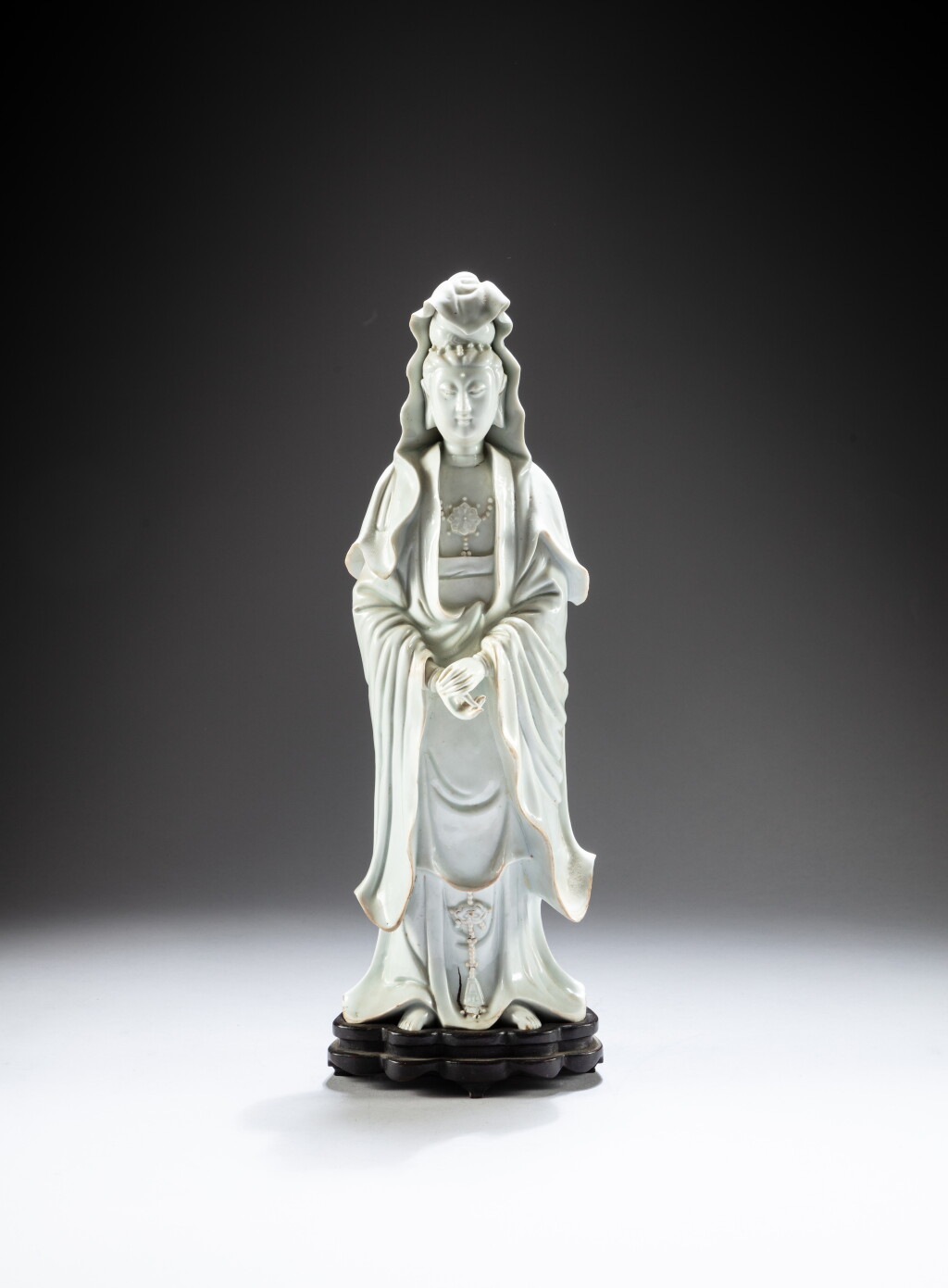 View full screen - View 1 of Lot 64. A blanc-de-Chine figure of Guanyin, Qing dynasty, 18th / 19th century.