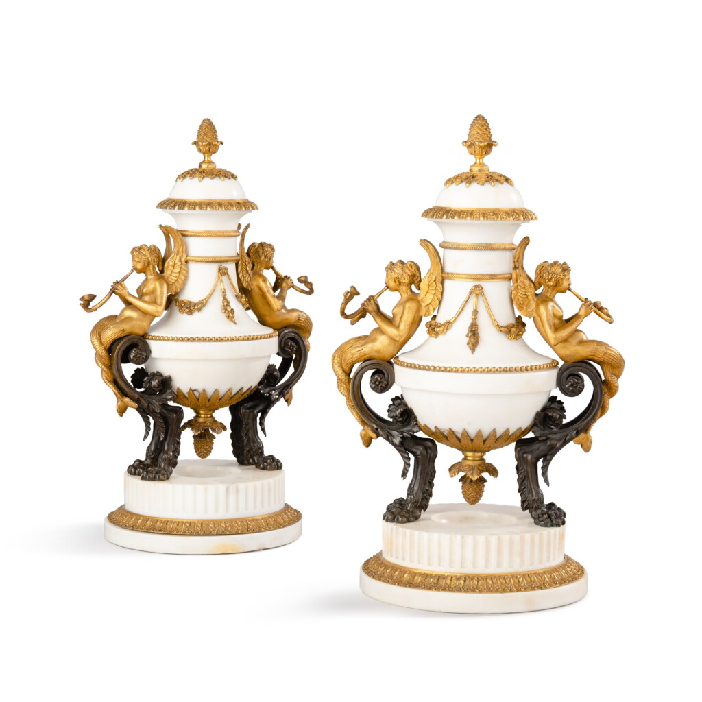 View full screen - View 1 of Lot 741. A pair of Louis XVI gilt-bronze mounted marble cassolettes, circa 1785-1790, attributed to Pierre-Philippe Thomire.