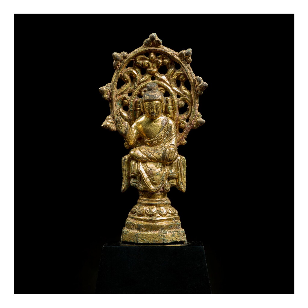 View full screen - View 1 of Lot 580. A SMALL GILT-BRONZE FIGURE OF MAITREYA, TANG DYNASTY.