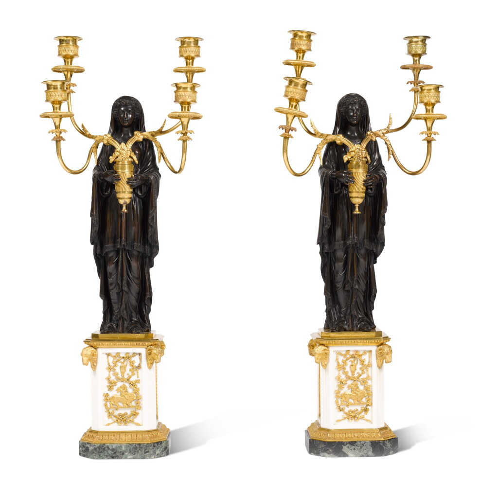 View full screen - View 1 of Lot 141. A Pair of Directoire Gilt and Patinated Bronze Four-Light Candelabra, Circa 1790.
