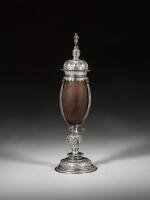 A Flemish silver-mounted coconut cup and cover, Mons, 1619/20, maker's mark a fleur-de-lys