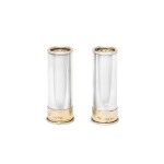 A pair of novelty Victorian parcel-gilt silver shotgun shell pepper shakers, Thomas Johnson, London 1883, retailed by William Thornhill, New Bond St