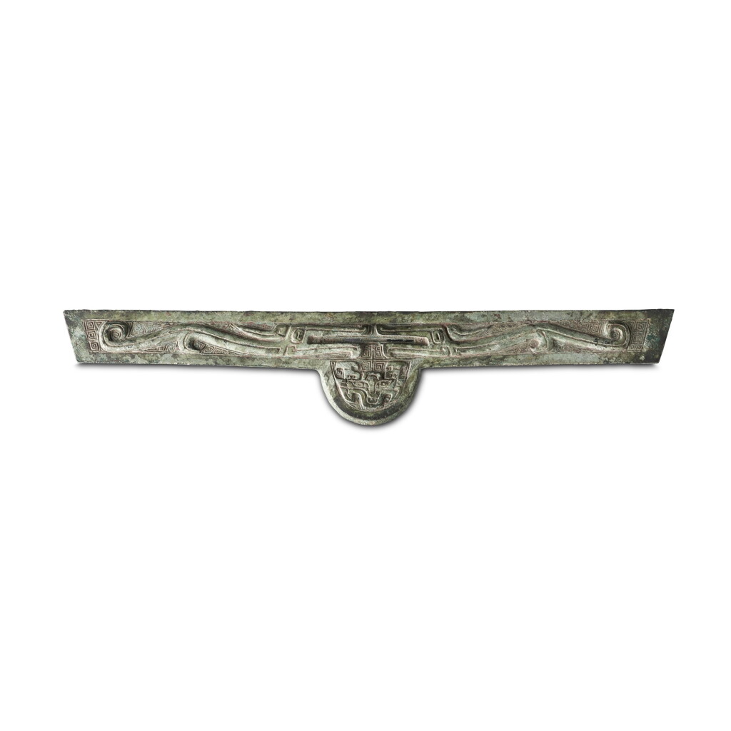 View full screen - View 1 of Lot 714. A bronze 'dragon' fitting, Western Zhou dynasty | 西周 青銅龍紋飾件.