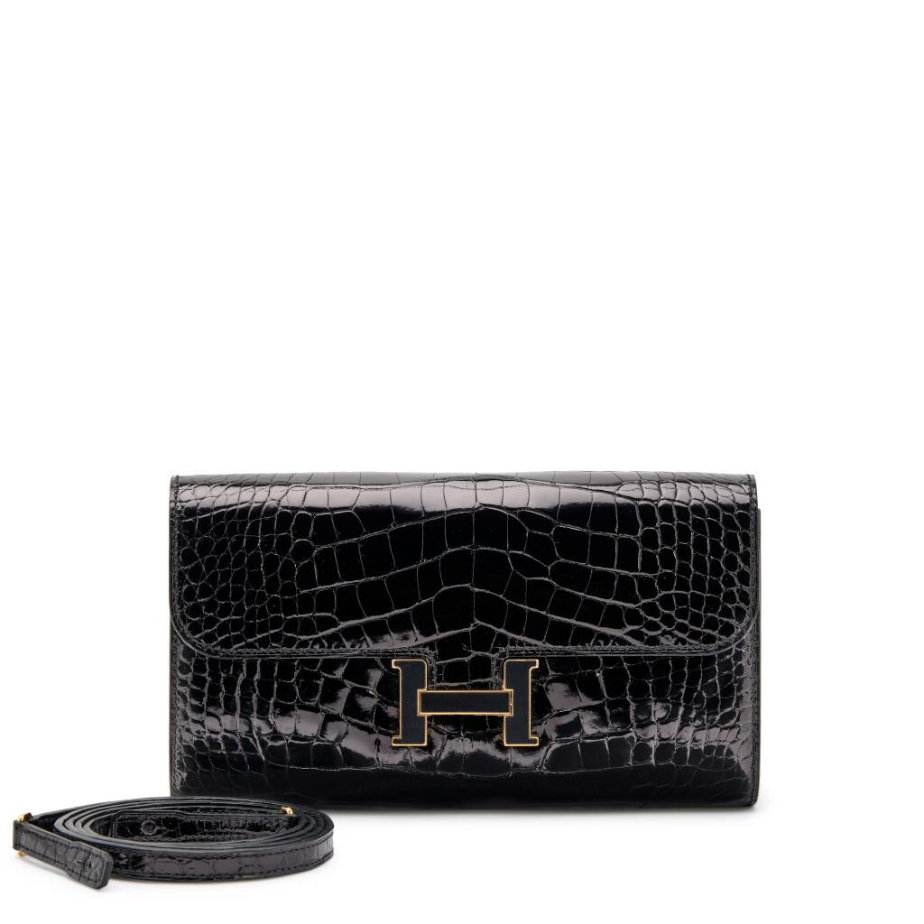 View full screen - View 1 of Lot 158. Black Shiny Alligator Constance-To-Go Wallet Black and Gold Enamel Hardware, 2019.
