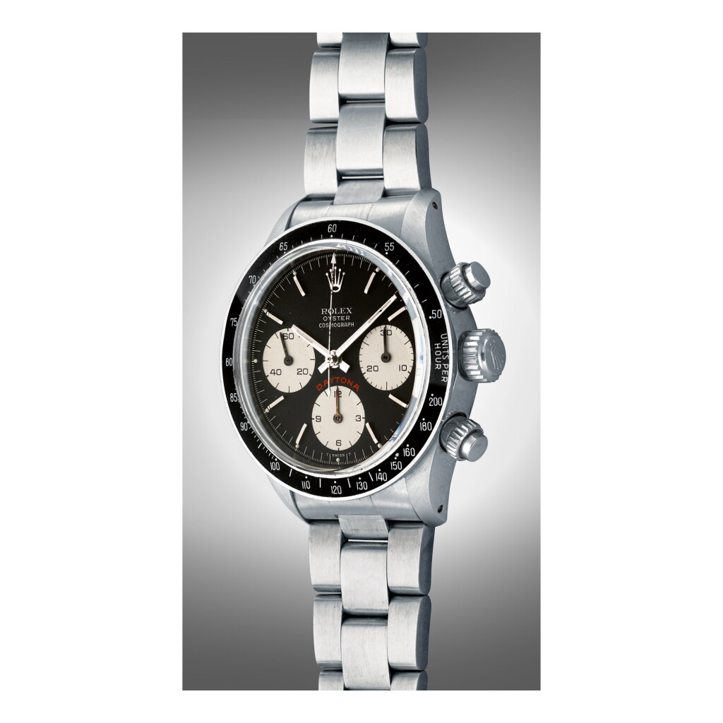 View full screen - View 1 of Lot 1061. ROLEX | REF 6263 'BIG RED' DAYTONA, A STAINLESS STEEL CHRONOGRAPH WRISTWATCH WITH REGISTERS AND BRACELET, CIRCA 1979 | 勞力士 |6263型號「'BIG RED' DAYTONA」精鋼計時鍊帶腕錶,年份約1979.
