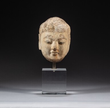 View full screen - View 1 of Lot 67. A carved marble head of Buddha, Tang dynasty | 唐 大理石佛首.