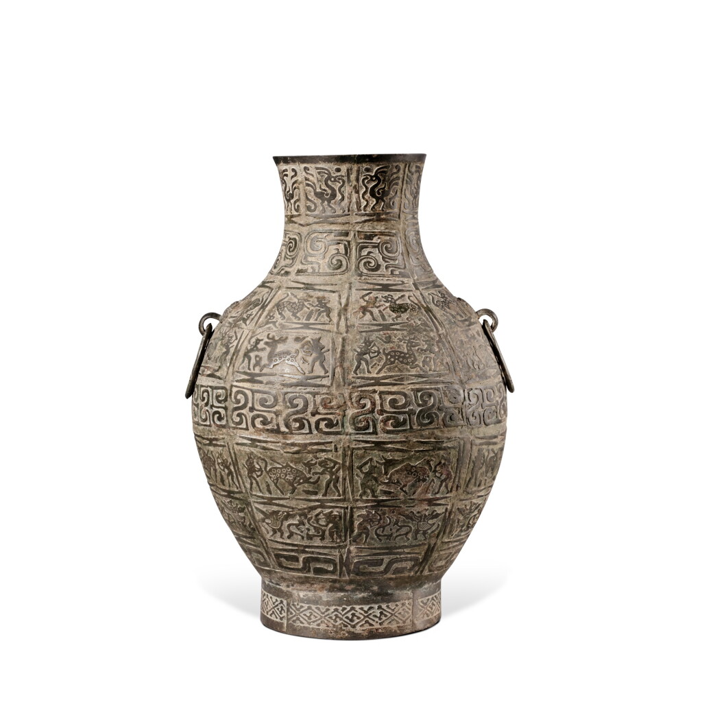 View full screen - View 1 of Lot 626. An archaic bronze 'hunting scene' wine vessel (Hu), Eastern Zhou dynasty, Warring States period | 東周 戰國 青銅狩獵圖鋪首耳壺.