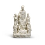 A Dehua porcelain group of Wenchang, 17th century