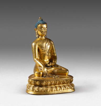 View full screen - View 1 of Lot 119. A gilt-copper alloy seated Buddha Tibet, 14th-15th century | 西藏 十四至十五世紀 鎏金銅合金佛坐像.