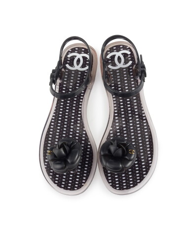 View full screen - View 1 of Lot 62. CHANEL | BLACK CAMELLIA JELLY ANKLE STRAP SANDALS .