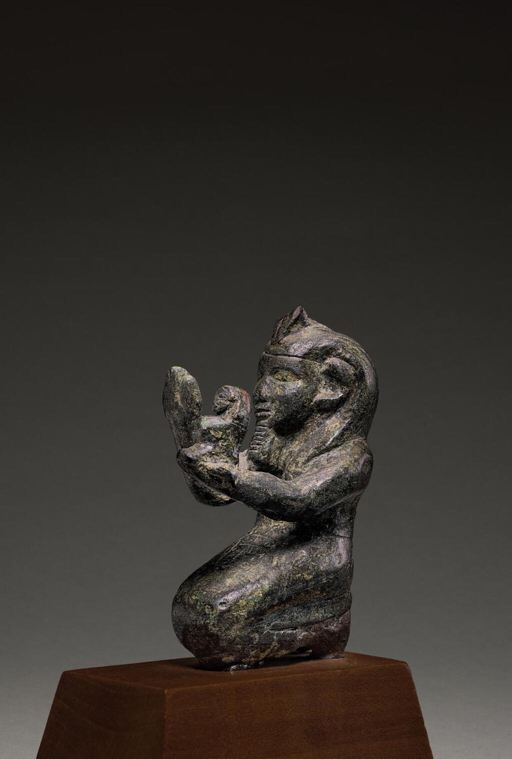 View full screen - View 1 of Lot 63. AN EGYPTIAN BRONZE FIGURE OF A KUSHITE KING, 25TH DYNASTY, 750-656 B.C..