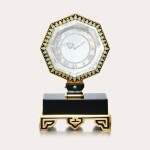 A magnificent and rare yellow gold, platinum, enamel, rock crystal, diamond and turquoise-set single axle mystery clock, Circa 1921