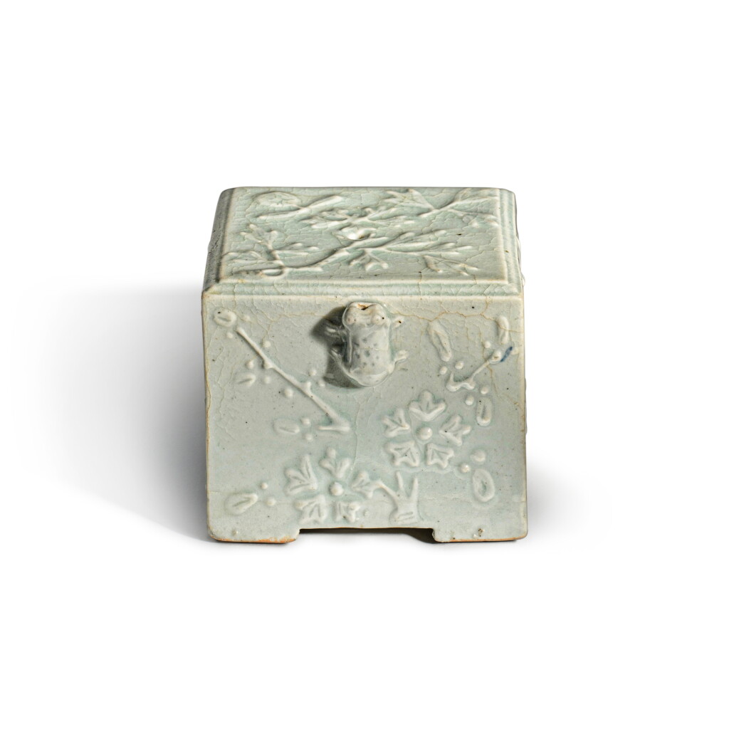 View full screen - View 1 of Lot 504. A molded white-glazed square-form waterdropper, Joseon dynasty, 19th century.