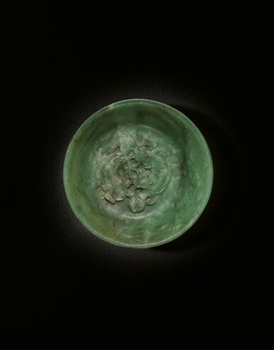 View full screen - View 1 of Lot 456. A spinach-green jade 'twin fish' bowl, Qing dynasty, 18th / 19th century | 清十八 / 十九世紀 碧玉雕年年有餘紋洗.