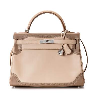 View full screen - View 1 of Lot 1870. Etoupe and Argile Swift Ghillies Retourne Kelly 32 Palladium Hardware, 2012 | 愛馬仕 | 大象灰及黏土灰Swift小牛皮Ghillies牛津花邊32公分Retourne內縫凱莉包配鍍鈀金屬件,2012年.