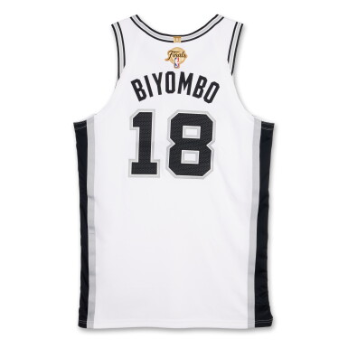 View full screen - View 1 of Lot 11. Bismack Biyombo San Antonio Spurs 2026 NBA Finals Game Issued Association Edition Jersey | Game 2.