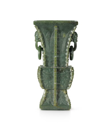 View full screen - View 1 of Lot 228. A spinach green jade archaistic vase Qing dynasty, 18th century | 清十八世紀 碧玉饕餮紋出㦸獸首活環耳方觚.