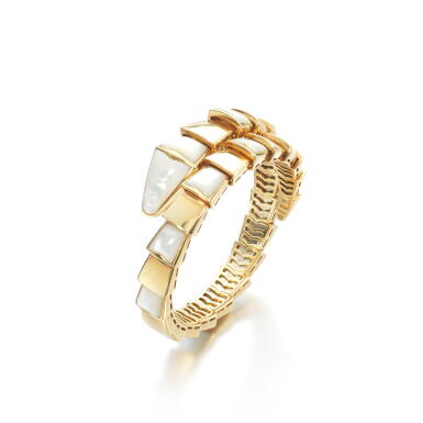 View full screen - View 1 of Lot 880. Mother-of-pearl and gold bangle, 'Serpenti'.