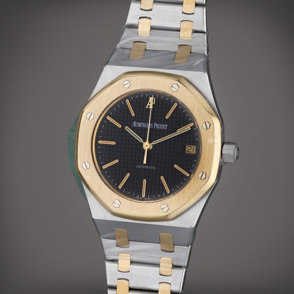 Voir en plein écran - Voir 1 du lot 206. Reference 14790SA.00.0789SA.01 Royal Oak | A yellow gold and stainless steel automatic wristwatch with date and bracelet, Circa 1995.