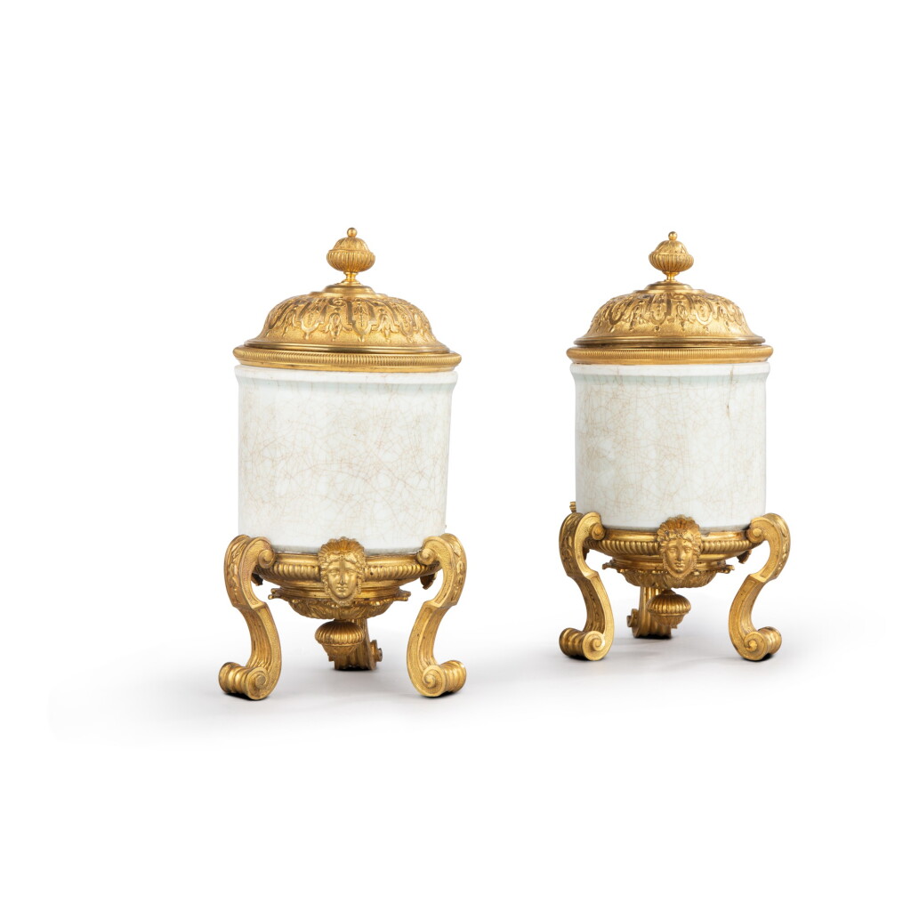 View full screen - View 1 of Lot 1344. A pair of French Régence style gilt-bronze mounted Chinese porcelain covered vases, 19th century.