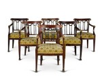 A set of six North Italian parcel-gilt and painted armchairs, early 19th century
